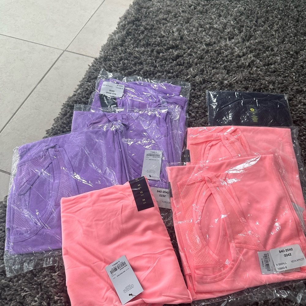 New with tags XS workout shirts 7 of them $20 for all